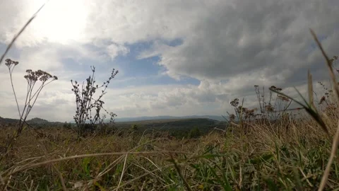 Moving clouds over a hill Stock Footage 142760208