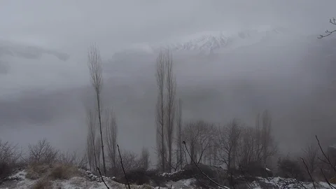 Moving Clouds over the Hunza and surrounding mountains Stock Footage 115302296