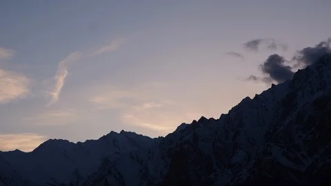 Moving Clouds over the Hunza and surrounding mountains Stock Footage 115573432