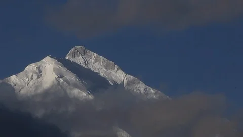 Moving Clouds over the Rakaposhi located in Hunza Stockbeeldmateriaal 114182830