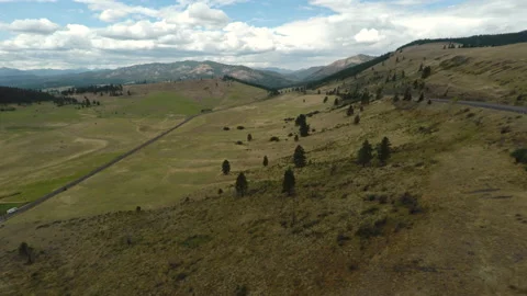 Moving clouds over a valley Video stock 154929072