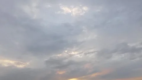 Moving clouds on sky during sunset Stock Footage 243141227