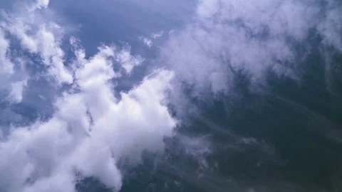 The moving clouds in the sky on a sunny day Stock Footage 145032512