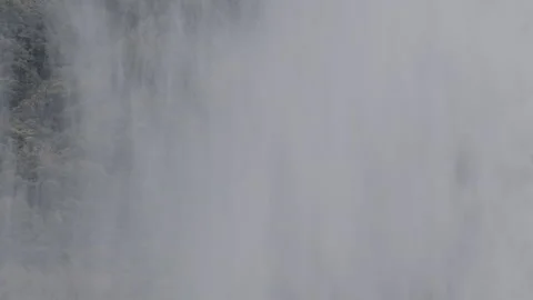 Moving clouds throught the mountains and the forest. Video stock 258668897