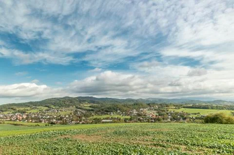 Moving clouds in two directions, above the village of the Krhova Beskydy Czec Фото