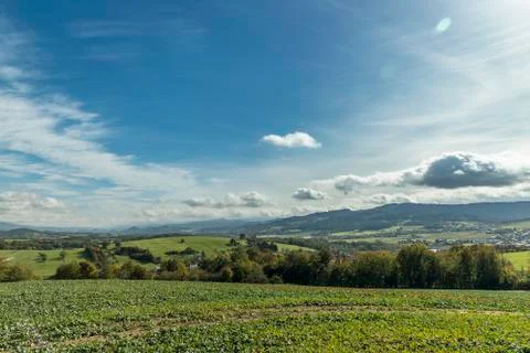 Moving clouds in two directions, above the village of the Krhova Beskydy Czec 库存照片