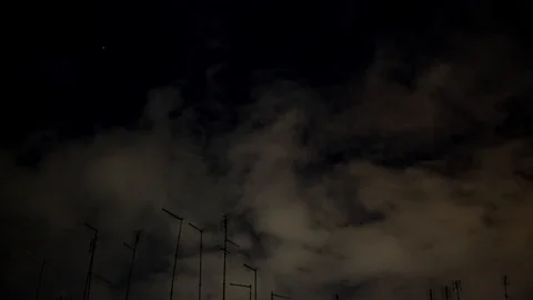 Moving clouds on a winter night Stock Footage 102348237