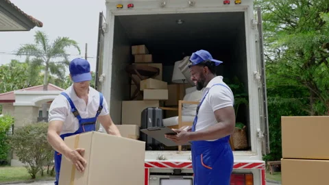 Moving company employee talking while waits for the owner to open the door Stock-Footage 219173234