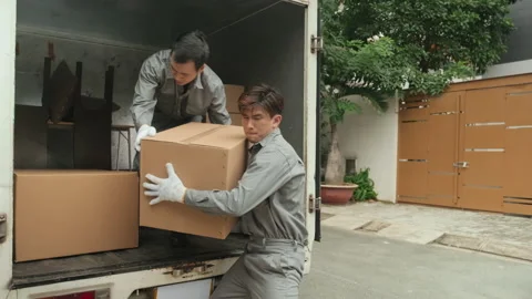 Moving Company Workers Taking Boxes from Truck 스톡 동영상 236022133