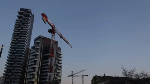 Moving construction crane with skyscrapers Stock-Footage 102035156