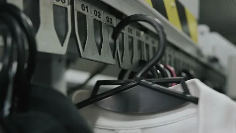 Moving conveyor for clothes in the laundry Stock Footage 221420091