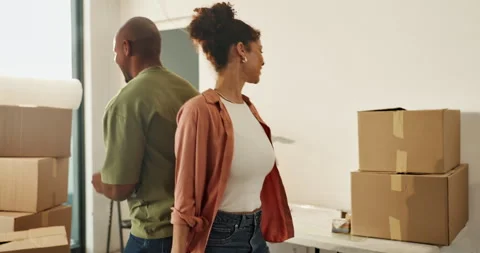 Moving, dance and couple with smile in new home, relocation and property Stockbeeldmateriaal 336776685