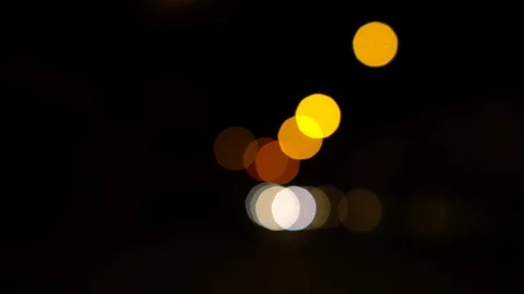 Moving defocused bright lights in the night Stock Footage 114121589