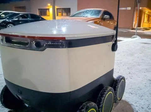 Moving delivery robot Stock Photos