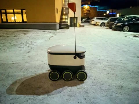 Moving delivery robot Stock Photos