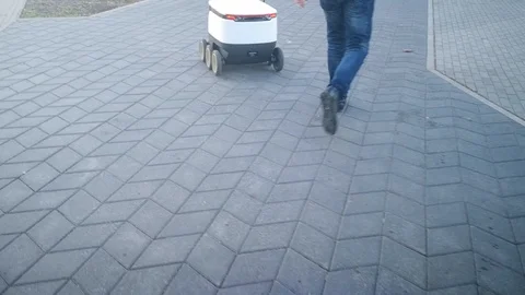 Moving delivery robots Stock Footage 122940080