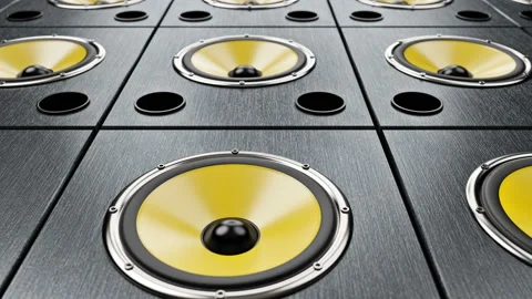 Moving diagonal over audio speakers with yellow membranes playing modern music Video stock 122050774