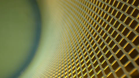 Moving down a curved metal grid. Focus starts far right and then moves to Stock Footage 162308657