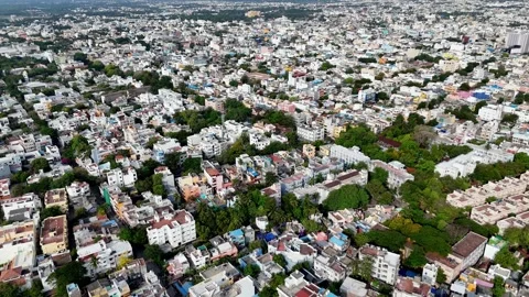 Moving down high-angle aerial shot captures a sprawling view of Puducherry. The Stock Footage 314643901