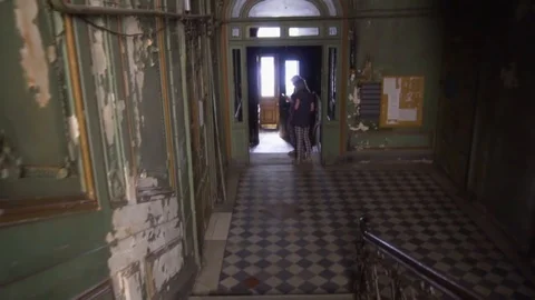 Moving down old city house staircase. Vintage doors and stairs. 19th Century. St Stock Footage 110785924