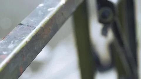 Moving down a paint splattered railing Stock Footage 74589316