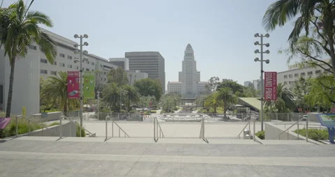 Moving down steps towards City Hall in Downtown Los Angeles Stock Footage 276519556