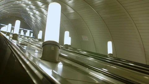 Moving down underground escalator Stock Footage 120663710