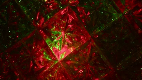 Moving drawings with rays of light of green and red colors on a black background 動画素材 305020509