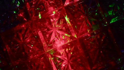 Moving drawings with rays of light of green and red colors on a black background 動画素材 305020516
