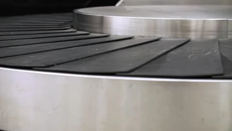 Moving empty baggage carousel at the airport Stock Footage 292387842