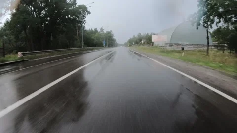 Moving on empty countryside road during heavy rain. Stock Footage 145489961