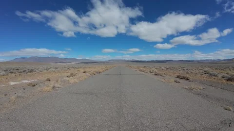 Moving on an empty stretch of road in Nevada Stock Footage 284982083