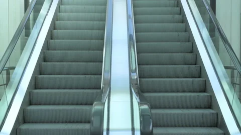Moving escalator up and down - stock video. Stock Footage 204782834