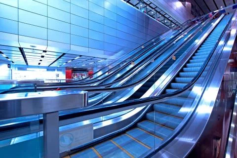 Moving escalator in blurred motion Stock Photos