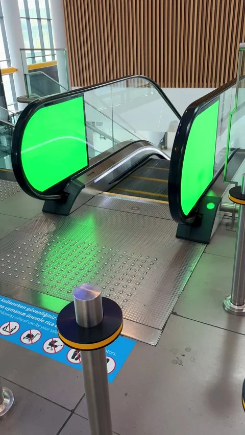 Moving escalator descending inside Istanbul Airport terminal without passengers Stock Footage 346565284
