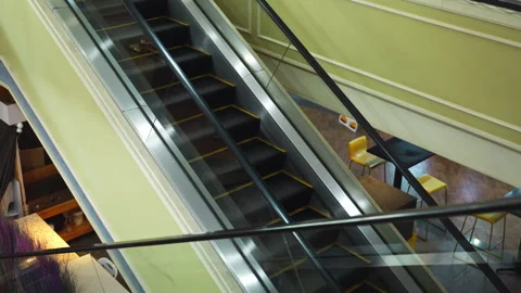 Moving up the escalator with glass sides Stock Footage 330957942