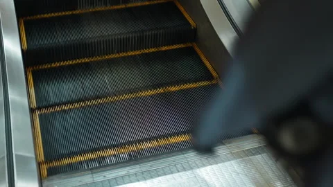 Moving up the escalator with glass sides Stock Footage 330957976