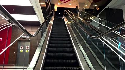 Moving escalator inside modern building Stock Footage 316552163
