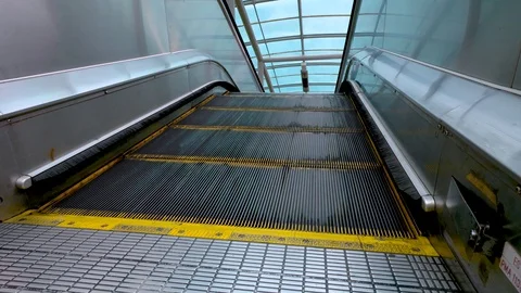 Moving escalator up, mecanic, electic. Stairs and escalators in a public area Stock Footage 93910415