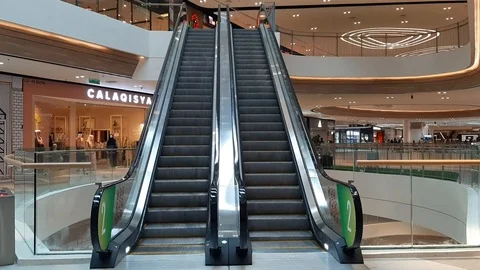 A moving escalator with no people on it Stock Footage 108217477