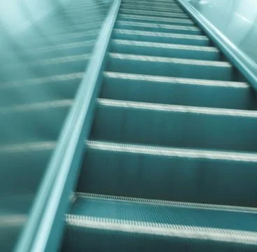Moving escalator Stock Photos