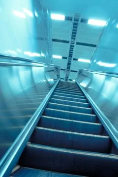 Moving escalator Stock Photos