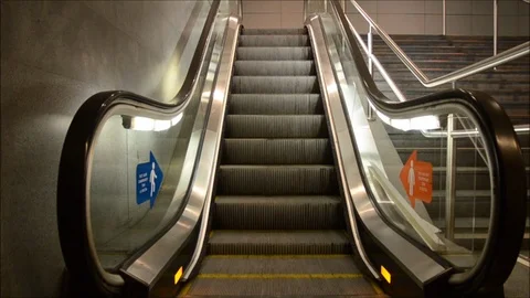 Moving escalator up in a public area Stock Footage