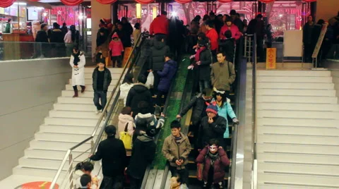 Moving on escalator in the shopping mall Stock Footage 1077686