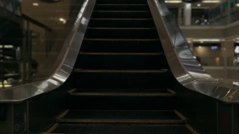 MOVING ESCALATOR IN SHOPPING MALL Stock Footage 209125219