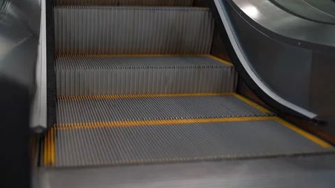 Moving escalator stairs close up Stock Footage 135742228