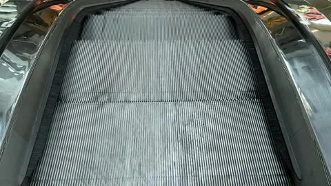 Moving escalator stairs close up Stock Footage 161476094