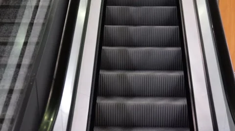 Moving escalator steps up. Stock Footage 68632968