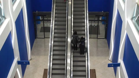 Moving escalators in the interior in 4K Stock Footage 124610630