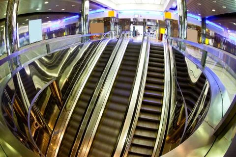Moving escalators Stock Photos